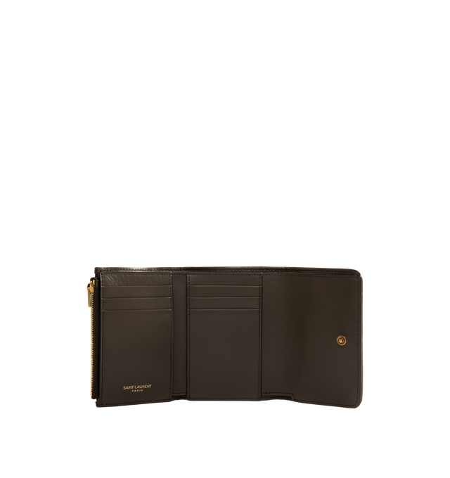 Image 3 of 3 - BROWN - Saint Laurent Womens Tri-Fold Wallet is crafted from calfskin leather. Features signature CASSANDRE hardware, quilted topstitching, snap-button closure, six card slots, one bill compartment, one zip coin pocket, and bronze-tone hardware. Dimensions: 12  11.5  2.5 cm. Main Material: Calfskin Leather; Hardware: Brass. Made in Italy. 