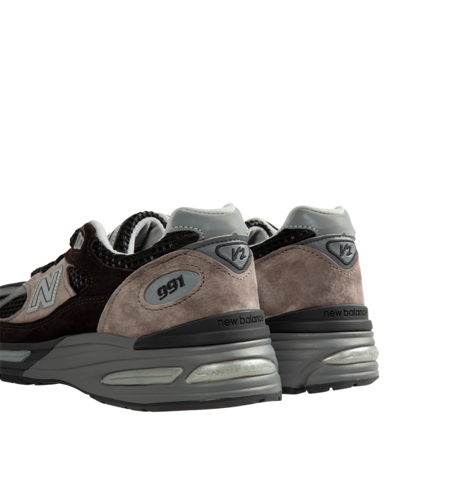 Image 3 of 5 - NEUTRAL - New Balance Unisex Made in UK 991v2 Elevated Neutrals Sneakers is crafted in pigskin suede, mesh, and synthetic materials. Full-length FuelCell cushioning is paired with semi-translucent ABZORB SBS pods and an ENCAP midsole, while reflective details, a debossed "N" logo, and embroidered tongue branding complete the design. Upper: Pigskin Suede, Mesh, and Synthetic Materials. Made in UK. *Unisex style in men's sizing. 