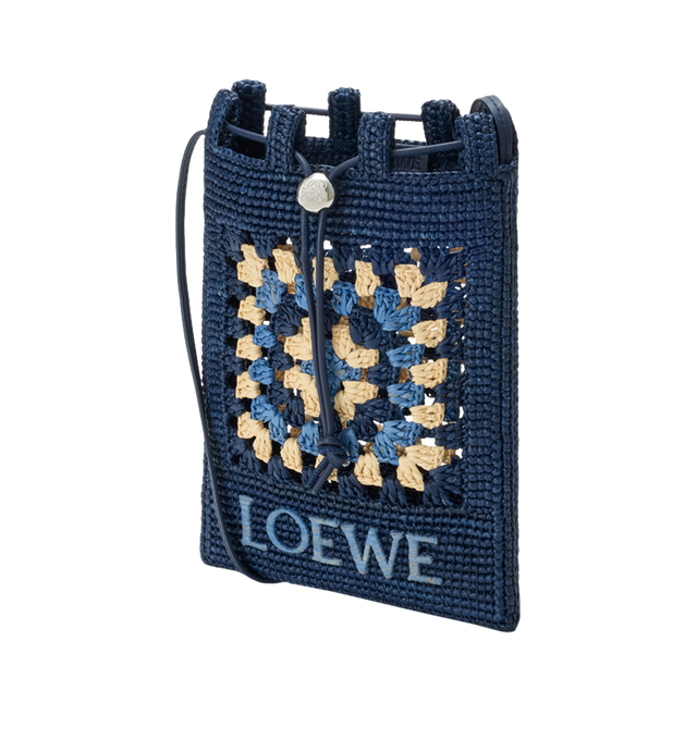 Image 2 of 4 - NAVY - LOEWE PAULA'S IBIZA Drawstring pocket in classic calfskin and raffia featuring a classic calfskin strap adjustable via an Anagram Pebble dice and a contrast LOEWE embroidery, shoulder or crossbody carry, unlined and engraved Anagram. Raffia/calf. 21 cm x  16 cm x 1 cm. Made in Spain. 