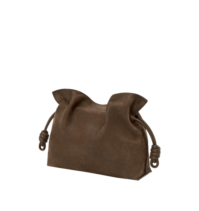 Image 2 of 4 - BROWN - Loewe Medium Flamenco Clutch is crafted from grained nubuck and features the brand's signature soft, slouchy silhouette with a cinched closure and iconic knot drawstrings. Designed for shoulder, crossbody, or hand carry with a detachable and adjustable strap, discreet magnetic closure, nappa lambskin lining, and embossed LOEWE logo. Main Material: Grained Nubuck. Lining: Nappa Lambskin. Dimensions: 30 cm W  24.5 cm H  10.5 cm D. Strap Length: 96-120 cm. Strap Drop: 38-44 cm. Weight: 0 