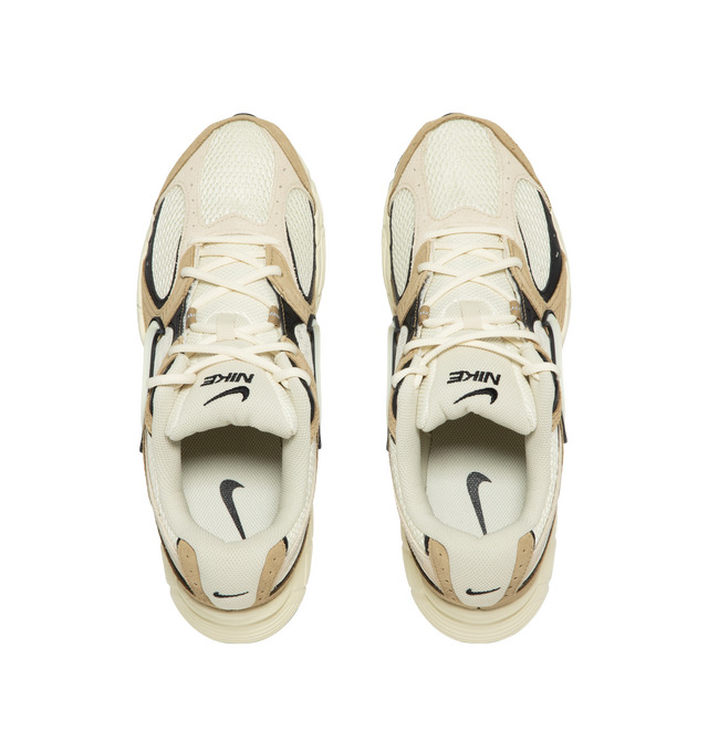Image 5 of 5 - NEUTRAL - Nike V5 RNR Sneakers feature a streamlined silhouette designed for smooth, steady movement. A low-cut collar allows natural ankle mobility, while reflective details enhance visibility in low-light conditions. 