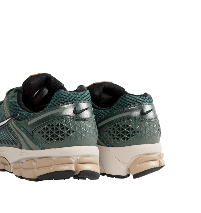 Image 3 of 5 - GREEN - Nike Zoom Vomero 5 Sneakers are a lace-up style with a low profile design, padded tongues and cuffs, signature branding, Zoom Air units for cushioning, rubber outsoles, and textured grip treads.  