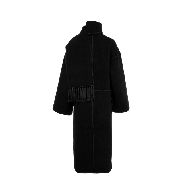 Image 2 of 3 - BLACK - TOTEME oversized coat with an embroidered attached scarf that wraps elegantly around the neck. Crafted from a heavyweight wool blend with artisanal blanket stitching and lustrous tassels, then complete with spacious pockets, high side slits and a buttoned front. 68% wool, 20% wool recycled, 12% polyester recycled. 