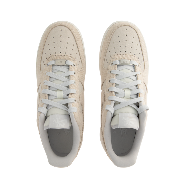 Image 5 of 5 - NEUTRAL - NIKE Air Force 1 '07 LV8 'Denim' Sneaker featuring leather upper with a perforated toe box, Nike Air cushioning and rubber outsole with heritage hoops pivot circles. 