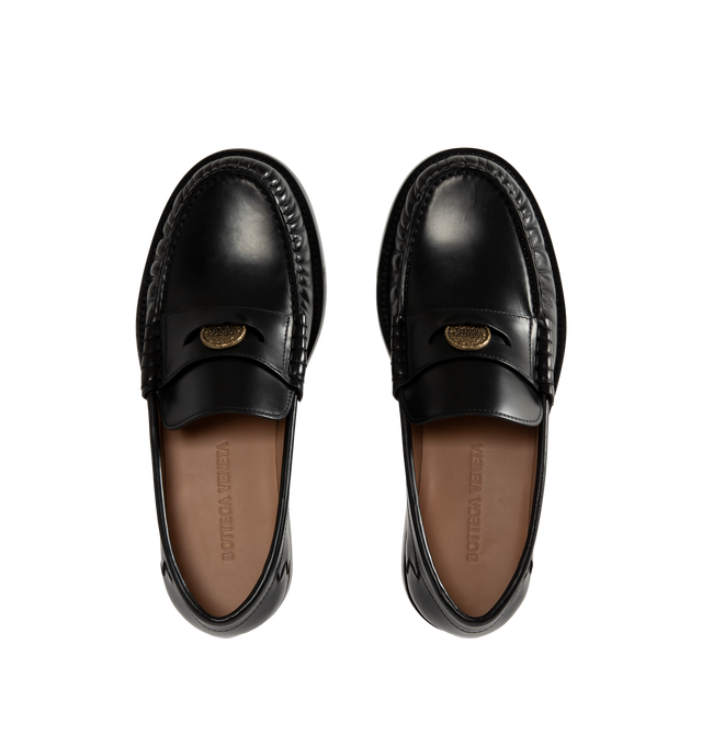 Image 4 of 4 - BLACK - Bottega Veneta Men's Penny Loafers are crafted from shiny leather and feature a timeless slip-on silhouette with a classic penny strap with metal coin detail across the vamp. Main Material: Leather. 