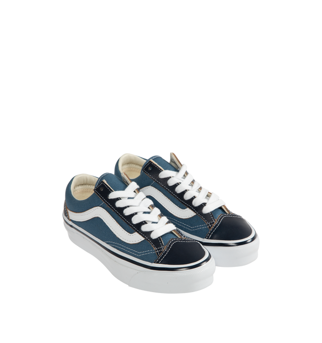 Image 2 of 5 - NAVY - VANS OTW Old Skool 36 Vibram Sneaker featuring canvas upper, leather overlay at tongue, toe, and heel wrap, padded collar, formstripe at lateral sides, topstitched construction, flat cotton laces, VANS rubberized logo patch at heel and vibram rubber outsole. 