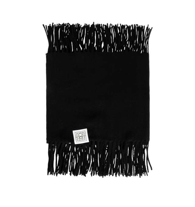 Image 1 of 2 - BLACK - Toteme Women's Fringed Cashmere Blend Scarf is crafted from a luxurious cashmere blend and features a timeless oversized silhouette designed for versatile cold-weather layering. Main Material: 90% Recycled GRS Cashmere, 5% Cashmere, 3% Wool.  