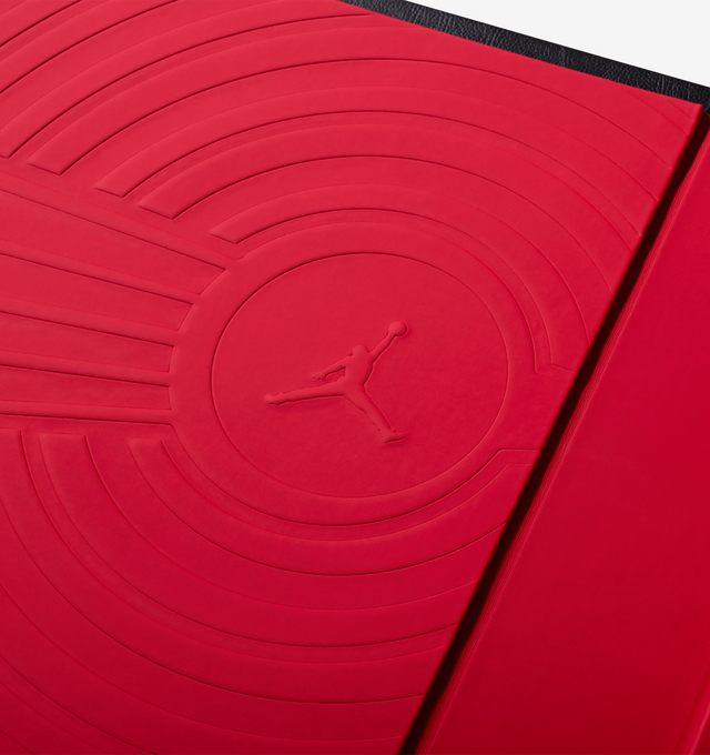 Image 7 of 20 - MULTI - Assouline celebrates 40 years of Air Jordan with a landmark Ultimate volume, created in collaboration with Michael Jordan and the Jordan Brand. This collectors piece honors the enduring influence of Michael Jordan and the brand that reshaped sport, style, business, and culture worldwide.Limited to 1,000 hand-numbered copies, the Ultimate edition is crafted with a host of bespoke details. Encased in an intricately tooled leather clamshell, the cover features Baroque-inspired embossing 
