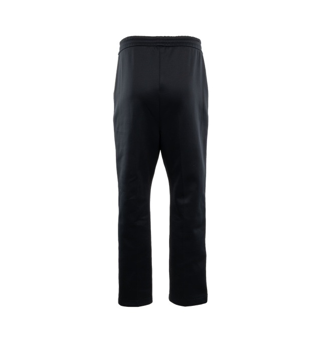Image 2 of 3 - BLACK - FEAR OF GOD Stripe Relaxed Sweatpant featuring a relaxed fit with a pintuck stitch to shape the leg and a sports-inspired canvas side stripe, pockets, encased elastic waistband, elongated drawstrings and Fear of God leather label at the center front. 60% nylon, 40% cotton. 