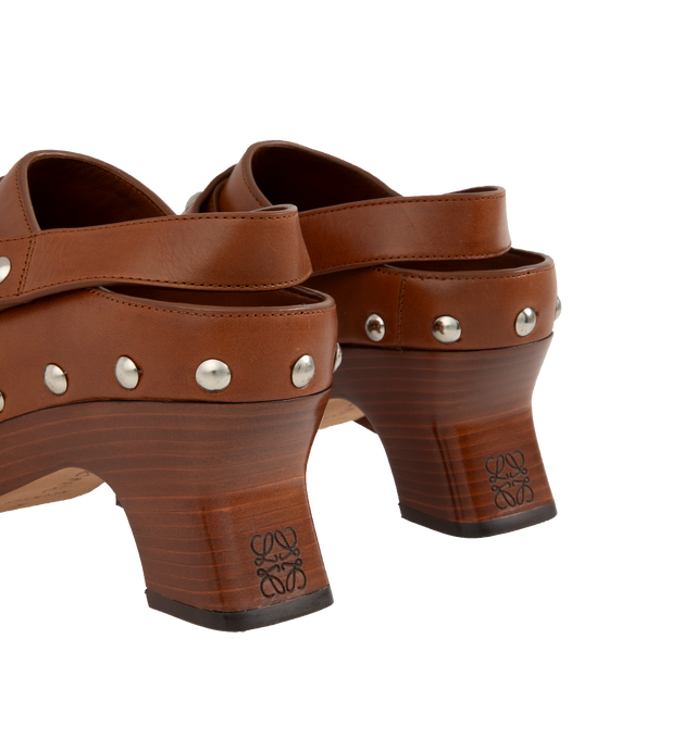 Image 3 of 4 - BROWN - LOEWE Clog in vegetal-tanned calfskin with a chunky monoblock sole and all around studs on the upper, a slingback strap and slanted heel. Featuring 70mm heel with lasered Anagram on the back of the heel, leather insole and outsole. Made in Italy. 