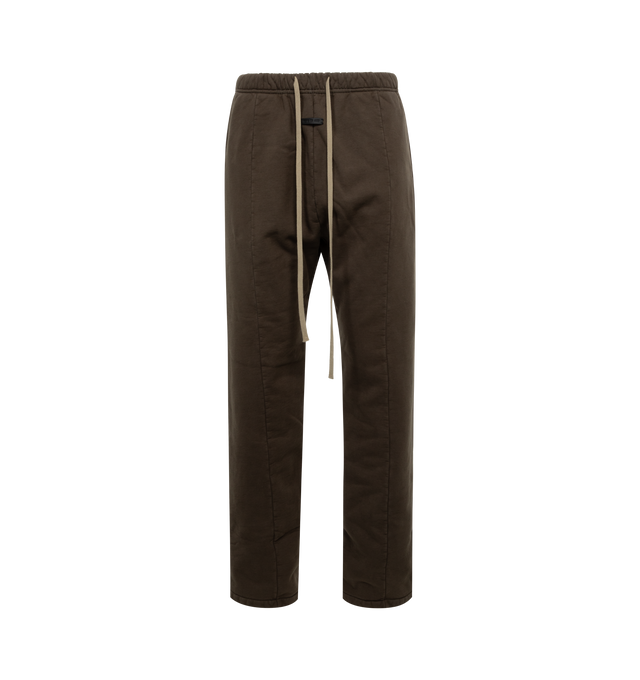 BROWN - FEAR OF GOD Forum Sweatpant featuring relaxed straight leg, dropped inseam with an updated front seam, slash pockets, an elongated drawcord, and a leather Fear of God label stitched at the center front. 100% cotton.