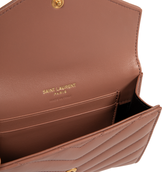 Image 3 of 3 - BROWN - SAINT LAURENT Small Envelope Wallet featuring quilted overstitching, leather lining, snap button closure, one flat pocket at back, four card slots and one open compartment. 5.3" X 3.7" X 1.2". 100% lambskin.  