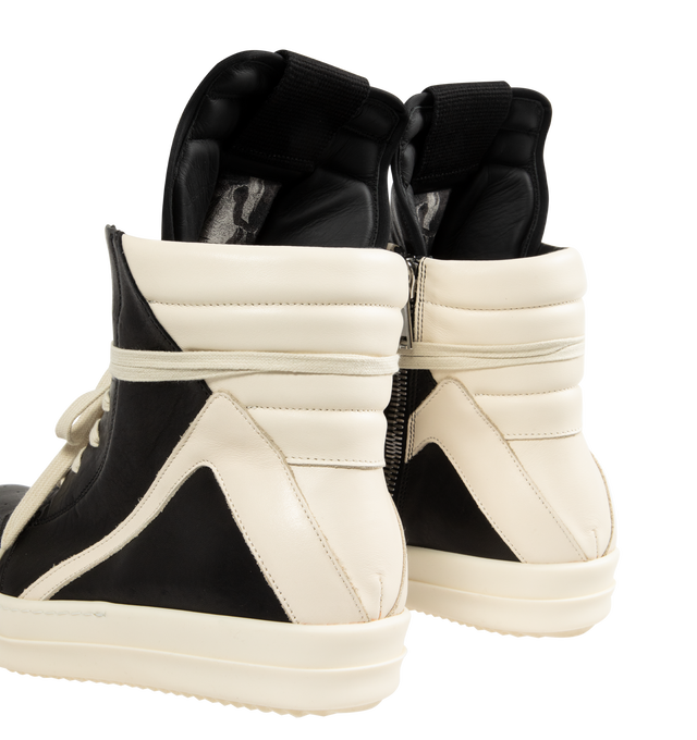 Image 3 of 5 - BLACK - Rick Owens Geobasket Sneakers (Mens) are a high-top lace-up style with padded collars, perforated details at the toes, zip closures at the inner sides, and treaded rubber soles. Calfskin uppers. Made in Italy.  