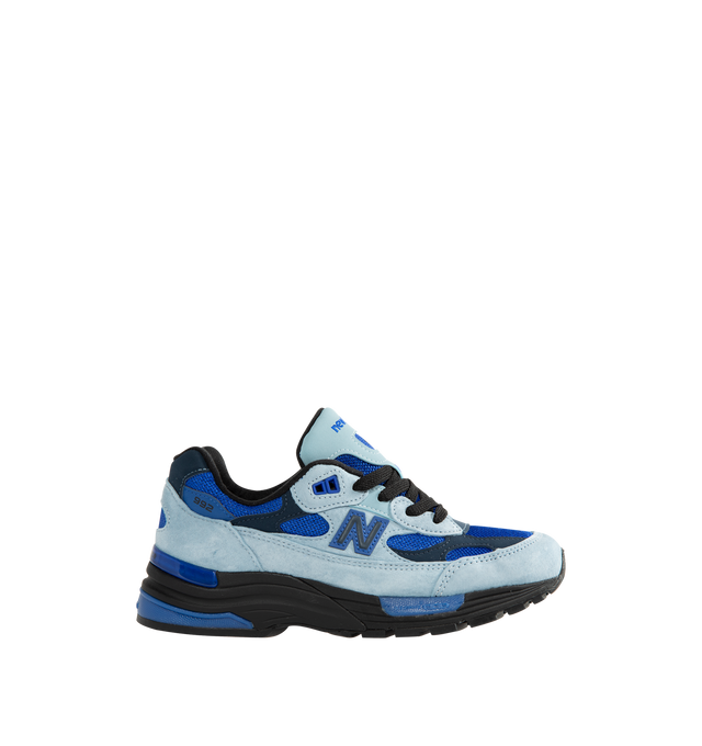 Image 1 of 5 - BLUE - New Balance Unisex Made in USA 992 Sneakers feature a timeless silhouette that blends premium craftsmanship with advanced comfort technology. A fan-favorite since its introduction, this seasonal edition showcases a tonal blue upper crafted from breathable mesh and premium suede overlays, contrasted by a black sole unit. ABZORB cushioning at the heel and forefoot provides exceptional impact absorption, while the ENCAP and C-CAP midsole combination delivers lightweight support and stabil 