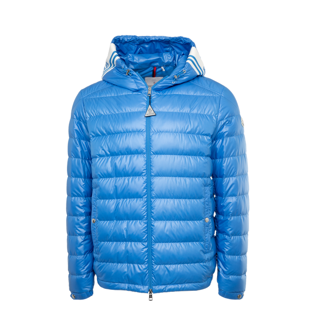 Image 1 of 4 - BLUE - MONCLER Cornour Padded Jacket featuring two-way zip fastening, adjustable hood, padded insulation, and rubberised logo and striped detailing across the hood. 100% polyester. Padding: 90% down, 10% feather. Made in Moldova. 