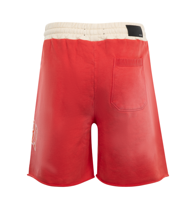 Image 2 of 3 - RED - AMIRI Vintage Collegiate Short featuring vintage-inspired colorblock, logo patch appliqu, elastic waist, drawstring with silver toned hardware, side slit pockets and back patch pocket. 100% cotton.  