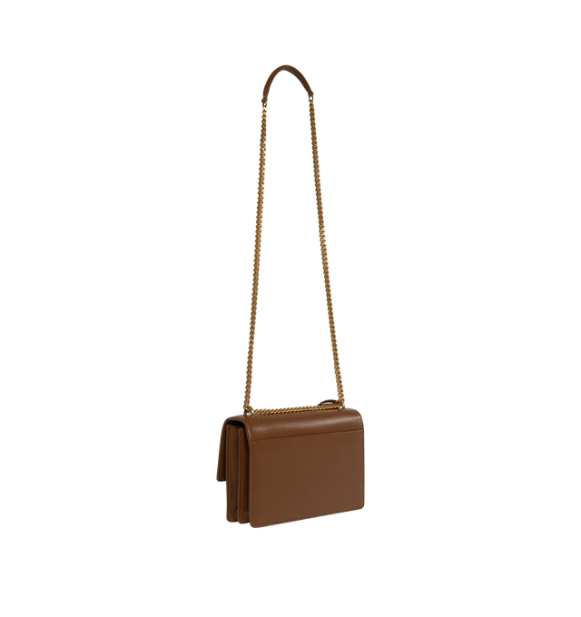 Image 2 of 3 - BROWN - SAINT LAURENT Sunset Monogram Envelope Bag has a chain shoulder strap, gold-tone hardware, and magnetic snap closure. 8 X 6.2 X 2.5 inches. 100% calfskin leather. Made in Italy.  