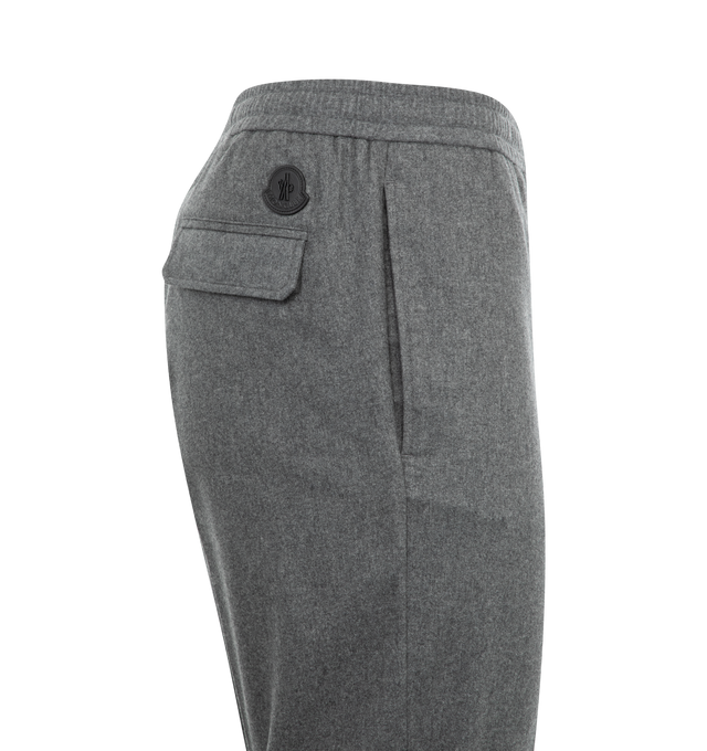 Image 3 of 3 - GREY - Moncler Drawstring Jogging Pants have a satin feel, zipper closure, drawstring waist, snap button back pockets, and a leather logo patch. 100% cotton.  