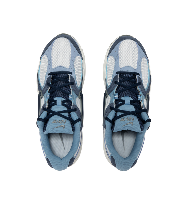 Image 5 of 5 - BLUE - Nike Men's V5 RNR Sneakers feature a layered suede and mesh upper for a breathable, Y2K-inspired look with retro running style. These lifestyle sneakers combine a lightweight foam midsole, plush collar lining, and a durable rubber outsole with 2000s-inspired grooves for all-day comfort and reliable traction. Main Material: Suede and Mesh. Midsole: Foam. Sole: Rubber.  