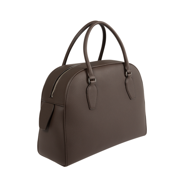 Image 2 of 3 - BROWN - THE ROW India 12.00 Bag in Leather featuring updated bowling bag in textured calfskin leather with tubular handles, branded metal padlock and key, and zipper closure. 11.81 x 4.72 x 9.45 in. Handle: 4.33 in. drop. 100% calfskin leather. Made in Italy. 
