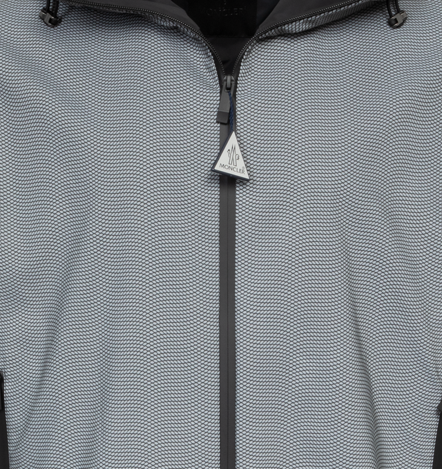 Image 4 of 4 - GREY - MONCLER Sautron Hooded Jacket featuring an attached drawstring hood, two-way zip fastening at the front, two zipped pockets, lined, Moncler logo at the sleeve, and elasticated trims. 100% polyester. 