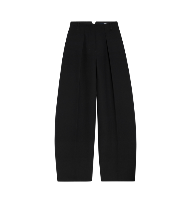 Image 1 of 1 - BLACK - JACQUEMUS Curved Pants featuring high-waisted, wide, curved fit, belt loops, hidden zip and button closure, pressed pleats, side-seam pockets, split waistband in the back and back welt pocket with "J" button loop. 100% polyester. Lining: 97% cotton, 3% elastane. Made in Bulgaria. 