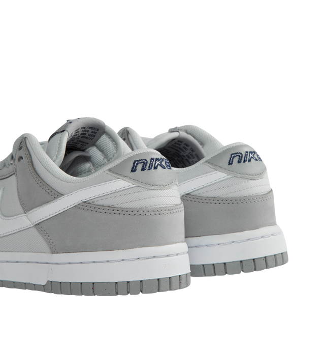 GREY - NIKE Dunk Low LX NBHD featuring foam midsole, padded, low-cut collar and rubber sole with classic hoops pivot circle.