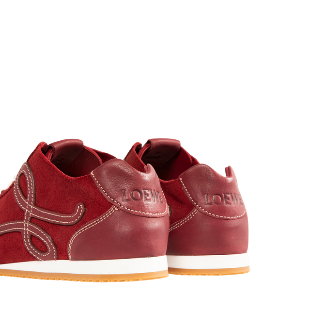 Image 3 of 5 - RED - LOEWE  Ballet Runner 2.0 Unlined Sneaker in deerskin and vegetable-tanned calfskin featuring an asymmetrical toe shape, an unlined sock-like internal structure, a lightweight textured outsole that extends to the toecap, 20mm heel, L monogram at the side, embossed Anagram on the tongue and embossed LOEWE on the heel tab. Deer/Classic Calf. Made in Italy. 