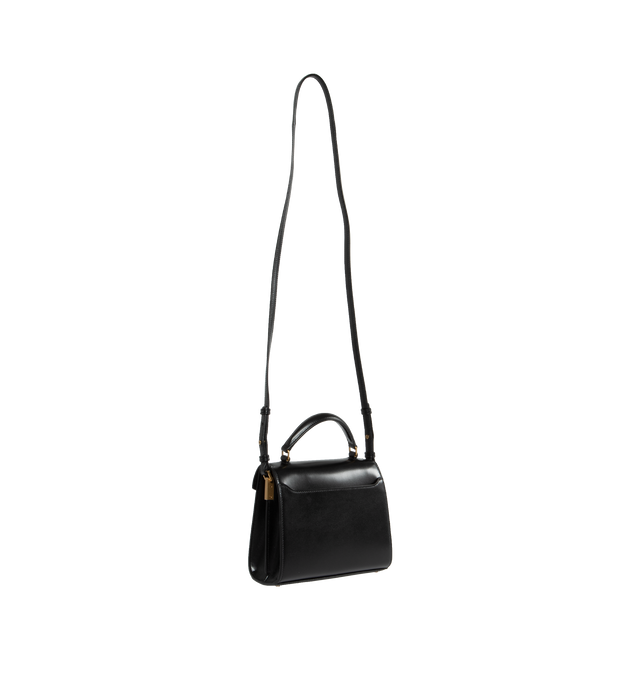 Image 2 of 3 - BLACK - SAINT LAURENT CASSANDRA MINI TOP HANDLE BOX BAG with front flap and pivoting metal Cassandre closure, featuring leather top handle, adjustable and detachable shoulder strap, bronze tone metal hardware,  leather lining, 2 interior compartments, one interior flat pocket, one exterior dossier pocket, four metal feet. Measures  7.8 X 6.2 X 2.9 inches with 20 inch drop shoulder strap. Calfskin leather. Made in Italy. 