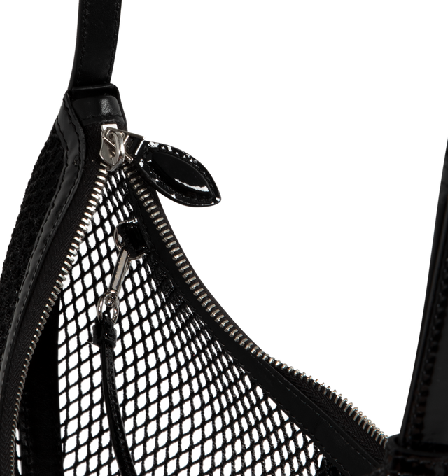 Image 3 of 3 - BLACK - ALAIA One Piece Demi Perforated Shoulder Bag in Leather and Nylon featuring adjustable shoulder strap, zip top closure and interior leashed zip pouch bag. Lining: leather. 6"H x 12"W x 0.5"D. Made in Italy. 