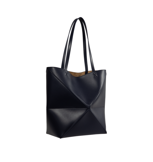 Image 2 of 4 - NAVY - LOEWE Puzzle Fold Tote in medium featuring double top handles, open top and suede lining. 10"W x 12" x 5.75"D. Leather. Made in Spain. 