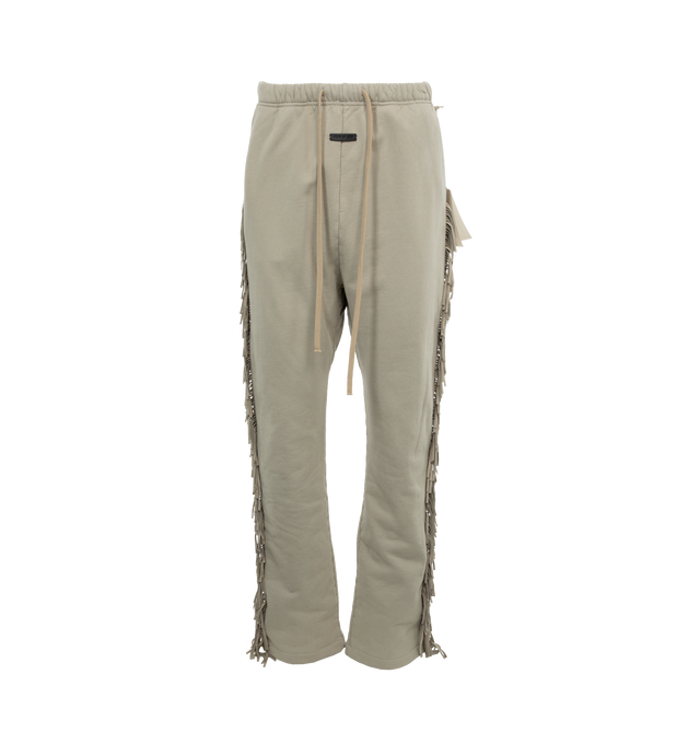 Image 1 of 4 - GREY - FEAR OF GOD Fringe Sweatpants featuring cotton fleece, fringe suede trim throughout, drawstring at elasticized waistband, two-pocket styling and rubberized logo patch at front. 100% cotton. Trim: 100% leather. Made in United States. 