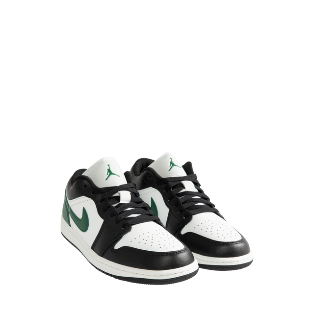 Image 2 of 5 - MULTI - Men's Air Jordan 1 Low Sneakers feature a genuine leather upper with the iconic low-top silhouette for a clean, timeless heritage look. These lifestyle sneakers combine encapsulated Air-Sole cushioning with a durable rubber outsole for lightweight comfort, lasting support, and reliable everyday traction. Main Material: Genuine Leather. Midsole: Encapsulated Air-Sole Unit. Sole: Rubber. 