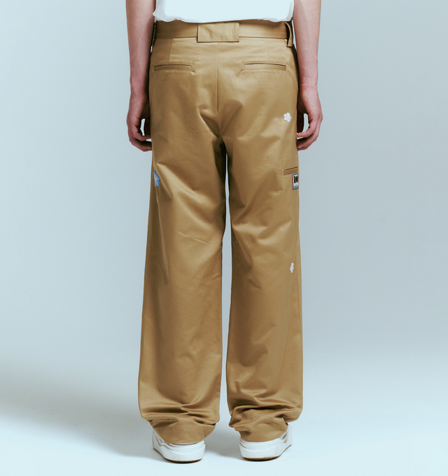 Image 4 of 4 - BROWN - NAHMIAS Flower Worker Pant featuring a straight-leg silhouette, flower embroidery throughout, button zip closure, side pockets, back welt pockets and belt loops at waist. 100% cotton. 
