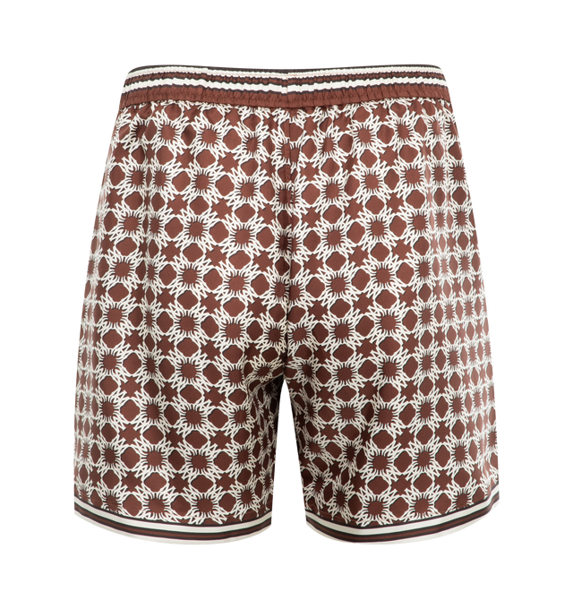 Image 2 of 3 - BROWN - Amiri MA Elastic Waist Quad Shorts have an elastic drawstring waist and a graphic print. 100% silk twill. Made in Italy.  