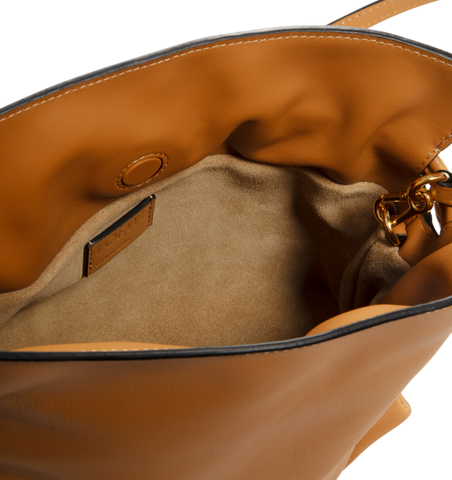 Image 3 of 4 - BROWN - LOEWE Flamenco Mini Napa Drawstring Clutch Bag featuring suede lining, coiled knot drawstring and hidden magnetic closure. 7"H x 9.4"W x 3.5"D. Convertible shoulder strap: 11 1/2" 23 1/2" drop. Nappa calf. Made in Spain. 
