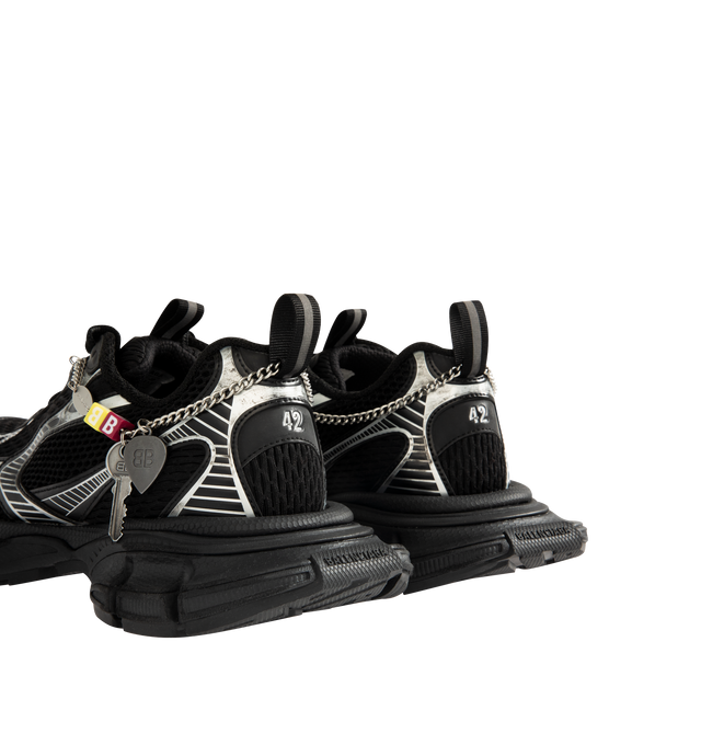Image 3 of 5 - BLACK - BALENCIAGA 3XL Sneaker featuring polyurethane and polyester, worn-out effect, aged-silver chain with charms on the upper, Balenciaga logo at the edge of the toe and at back, debossed size on the upper and at the back of the heel, 3XL rubber branding on the tongue and back and tongue pull-on tab with reflective detail. Upper: polyurethane, polyester. Sole: rubber, EVA. Insole: foam. 