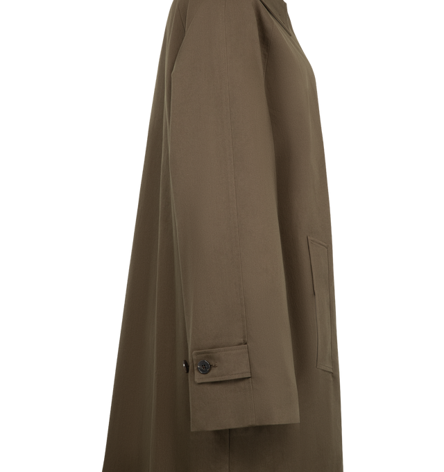 Image 3 of 3 - BROWN - The Row Women's Iza Coat is crafted from pure cotton and features an elongated trench-inspired silhouette with a refined, minimalist finish. Designed with a flat collar and horn button closure, this designer coat is finished with slant side pockets and a luxurious silk lining, reflecting The Row's understated approach to timeless outerwear. Main Material: 100% Cotton. Lining: 100% Silk. Closure: Horn Buttons. Collar: Flat Collar. Pockets: Slant Side Pockets. Care: Dry Clean. Made in I 