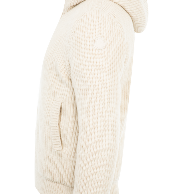 Image 4 of 4 - NEUTRAL - Moncler Reversible Padded Hoodie has an attached hood, a zip front closure, and side pockets. The cardigan reverses to a down-filled side or a wool and cashmere blend side. Lined. 99% wool, 10% cashmere. Made in Moldova.  