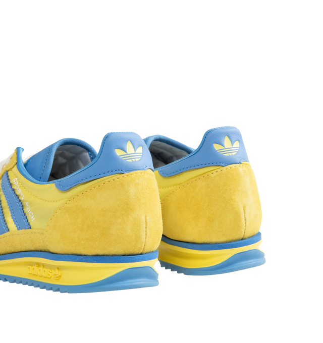 Image 3 of 5 - YELLOW - Adidas x Sporty & Rich SL 72 sneakers in bright yellow and blue colors inspired by Swedens national flag. Featuring retro elements and clean and minimalist style with adidas logo and Sporty & Rich branding. Unisex style in men's sizing. 