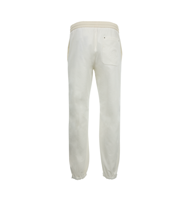 Image 2 of 3 - WHITE - Moncler Embroidered Logo Jogging Pants have an elastic drawstring waist, a zipper closure, side pockets, adjustable cuffs, and a rear patch pocket. Cotton and nylon canvas.  