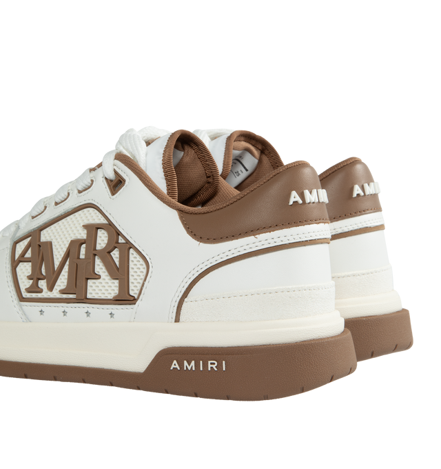Image 3 of 5 - BROWN - AMIRI Classic Leather Logo Low-Top Sneakers featuring rubber logo inserts on the sides, star-shaped perforations, flat heel, round toe, lace-up vamp, MA logo on the tongue, padded collar for comfort, raised backstay logo, rubber outsole and polyester lining.  