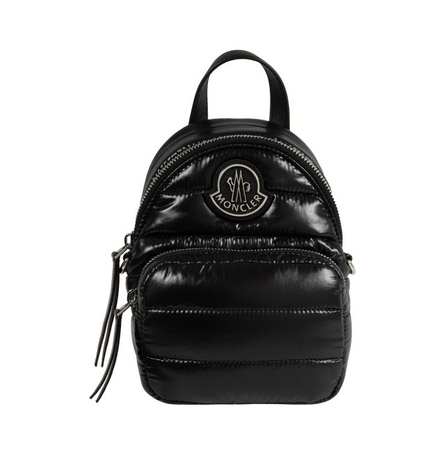 BLACK - MONCLER Small Kilia Cross Body Bag featuring water-repellent nylon lining, padded, leather handle, detachable shoulder strap, zipper closure, front zipped pocket, flat interior leather pocket, leather detailing and leather and metal logo. L 18 cm x H 15 cm x D 11 cm. 100% polyamide/nylon. Padding: 100% polyester.