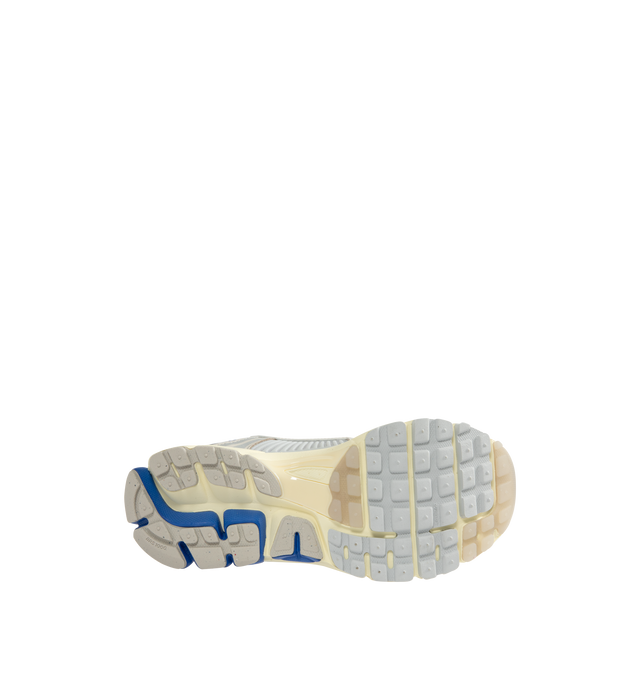 Image 4 of 5 - BLUE - NIKE Zoom Vomero 5 Sneaker featuring real and synthetic leather on upper, mesh panels and ventilation ports on heel, Air Zoom cushioning, plastic caging on side, rubber outsole and reflective details. 