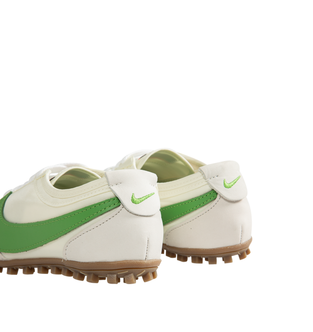 Image 3 of 5 - GREEN - Nike Men's Moon Shoe OG SP Sneakers feature a Sail, Light Bone, and Chlorophyll nylon upper with a leather Swoosh. Inspired by Nike's original 1970s running shoe, the streamlined silhouette is set on a rubber Waffle outsole for durable traction. Upper: Nylon and Leather. Sole: Rubber. 