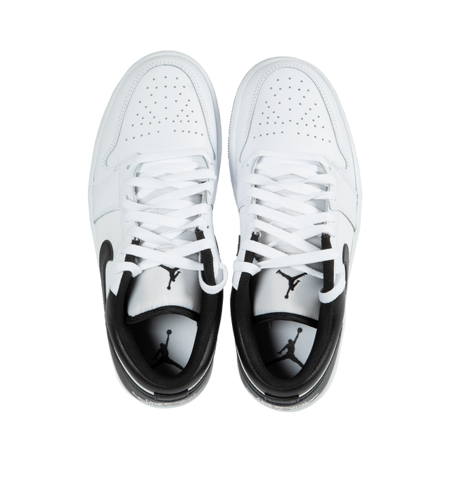 WHITE - AIR JORDAN 1 LOW features leather in the upper, foam outsole, wings logo on heel, stitched-down Swoosh logo and Jumpman design on tongue.