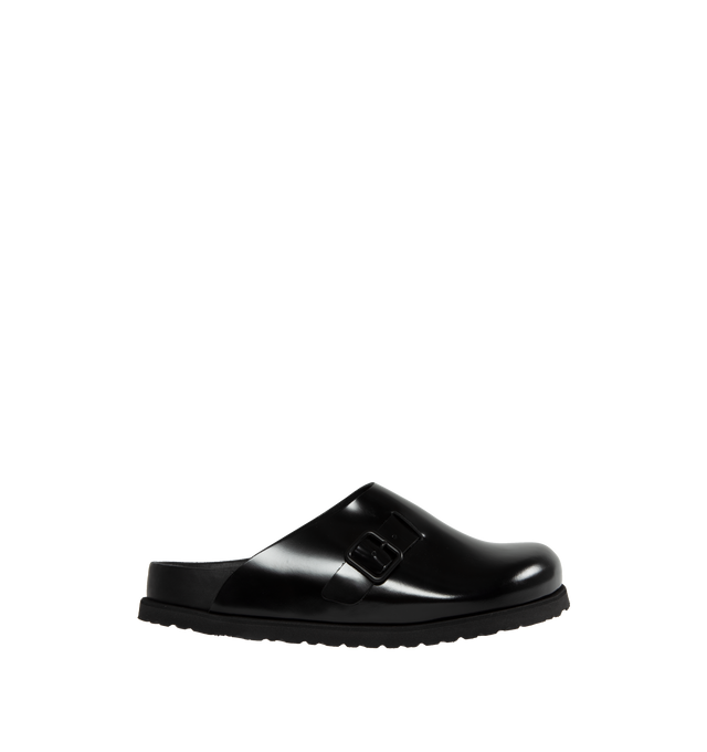 Image 1 of 4 - BLACK - Birkenstock 33 Dougal is a new silhouette created for the 1774 Collection, inspired by the timeless BIRKENSTOCK Boston clog design, updated in smooth leather with a high-shine finish and a color-matched buckle.  Upper: Luxurious smooth Berlin leather with a premium high-shine finish. Footbed: Anatomically shaped BIRKENSTOCK cork-latex footbed, covered with premium, color-matching smooth nappa leather.  Sole: EVA outsole with a 3mm EVA welt updates our standard die-cut outsole while st 