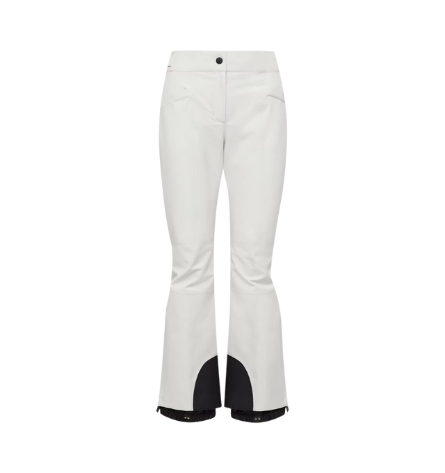 Image 1 of 1 - WHITE - Moncler Grenoble Women's Ski Trousers are a performance-focused silhouette designed for skiing and snowboarding. Engineered with heat-sealed seams, powder cuffs, ski-cut hem protection, and an integrated reflector, these technical trousers provide protection in demanding mountain conditions. Additional details include an adjustable snap-button waistband, thermal lining at the knees and back waistband, and water-repellent zip closures at the pockets and front. Main Material: 100% Polye 