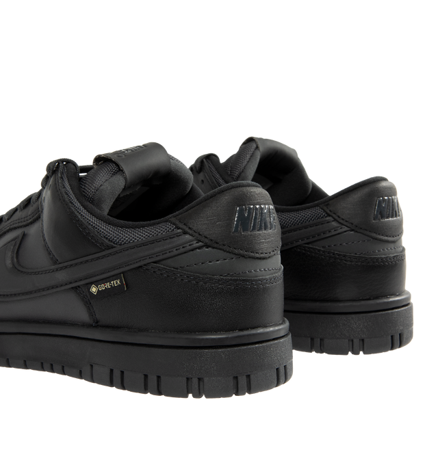 Image 3 of 5 - BLACK - NIKE Dunk Low GORE-TEX Sneaker featuring waterproof GORE-TEX, low-cut silhouette, reflective detail, padded collar, foam midsole and rubber outsole with classic pivot circle.  