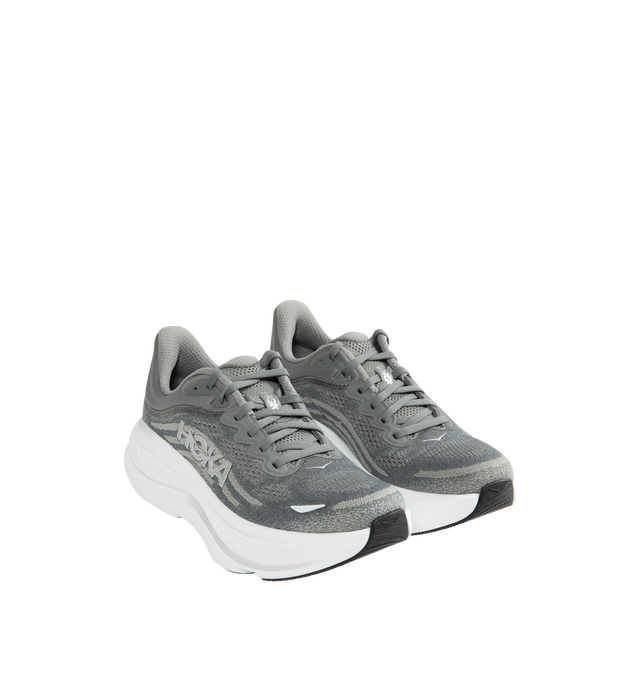 Image 2 of 5 - GREY - HOKA M Bondi 9 Sneaker featuring engineered mesh upper with rubber sole, lace-up front, foamed EVA midsole and increased stack height for maximum cushioning, zonal breathability, reflective detailing and cushioned tongue and collar. 